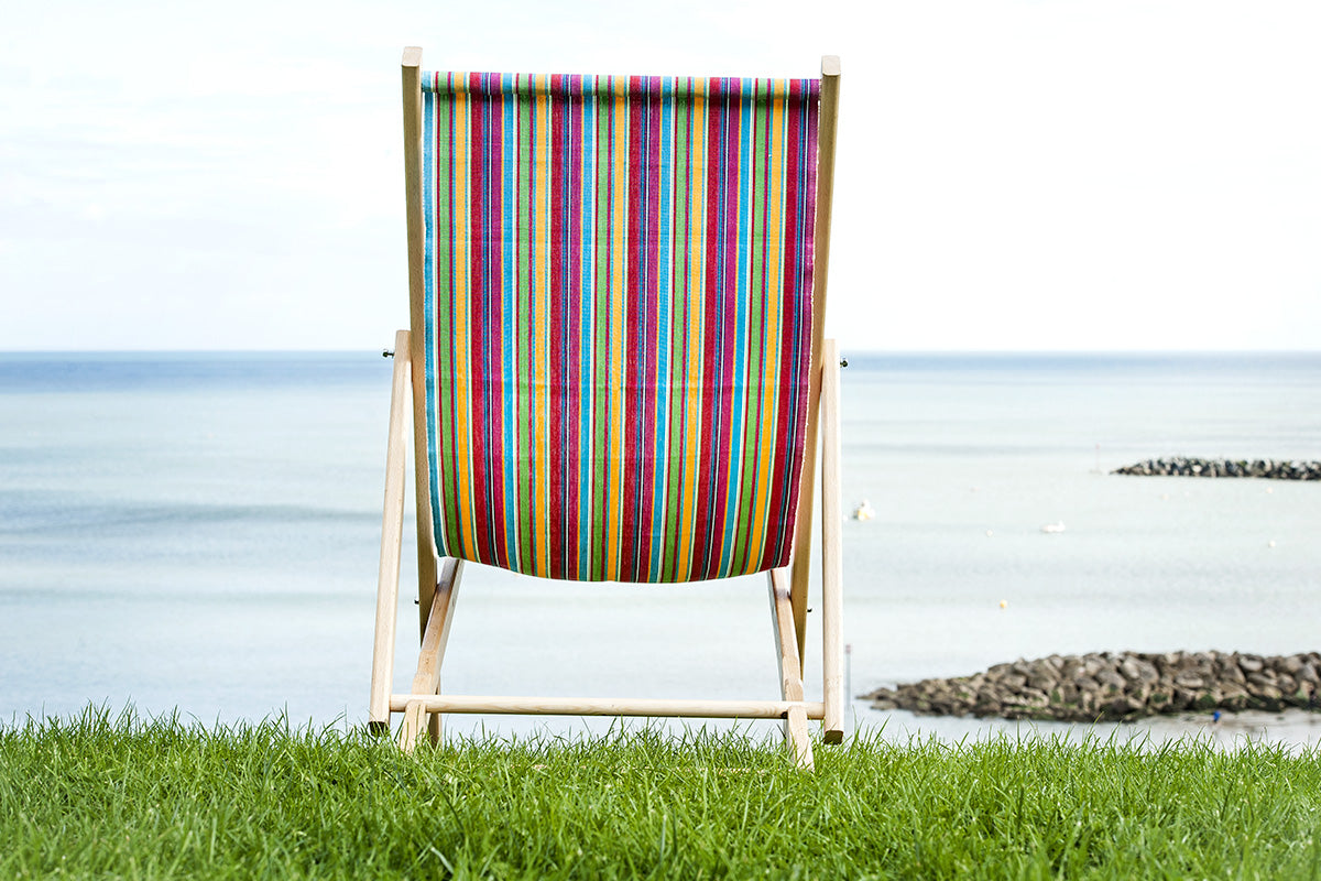 Finished deckchair On Grass Looking Out To Sea