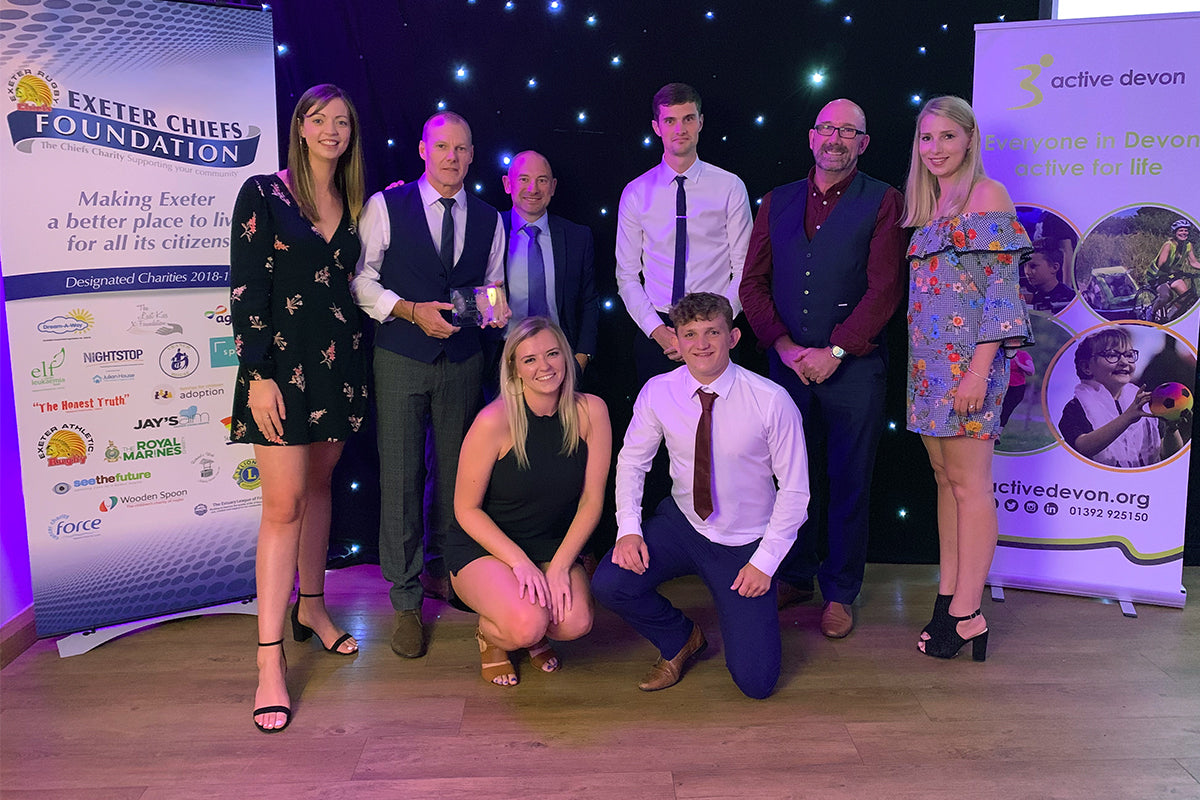 Collecting an award at the Devon Sports Awards event