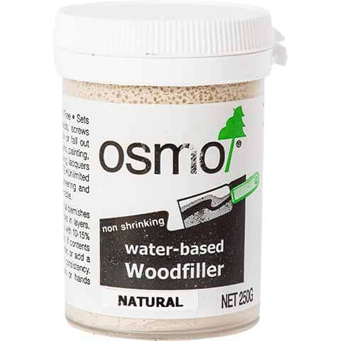A 250g jar of Osmo Natural Water-based Woodfiller, featuring a white plastic container with a white screw-on lid and a white label with black and green text.