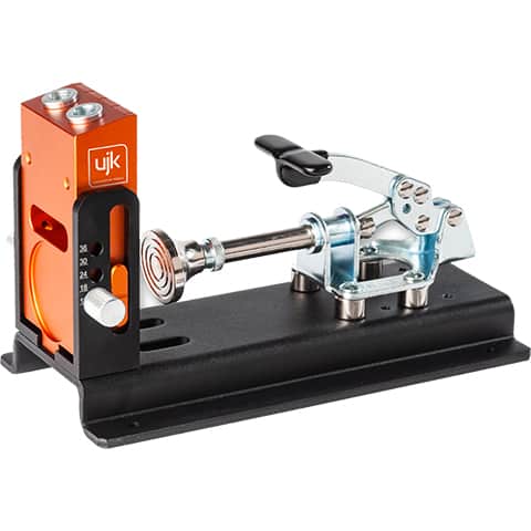 Orange, black and grey UJK pocket hole jig on white background
