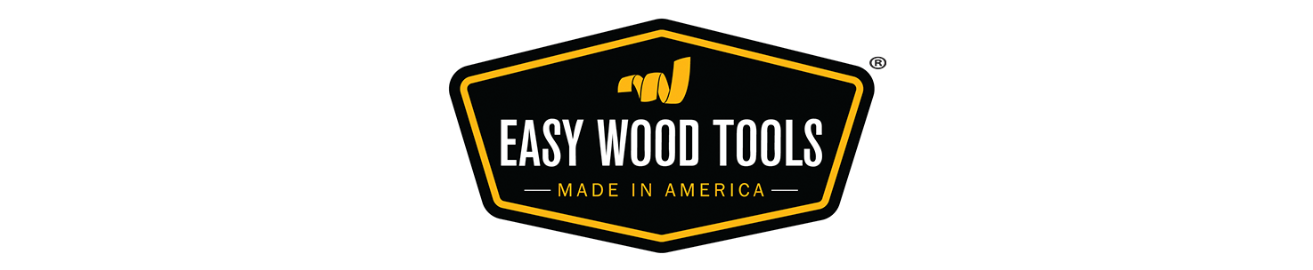 The words Easy Wood Tools made in America appear on a black shape with yellow outline and an image of a wood shaving. 