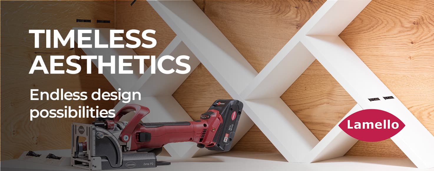 A red and black cordless jigsaw saw resting on a wooden surface in front of a white geometric wooden wall display. Large white text on the left reads 'TIMELESS AESTHETICS' and 'Endless design possibilities', with a Lamello logo badge on the right.